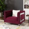 Single red velvet sofa