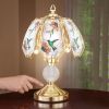 Hummingbird lamp with gold base and stained glass panel; table decoration for any room in the home