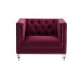 Single red velvet sofa