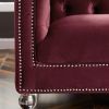 Single red velvet sofa