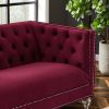 Single red velvet sofa